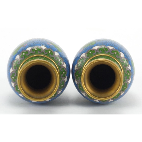 529 - Pair of Chinese cloisonné vases, both enamelled with flower heads and foliate scrolls, each 11cm hig... 