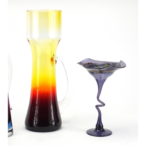 576 - Art glassware including a red glass bowl, purple Sommerso jug and stylised signed vase, the largest ... 