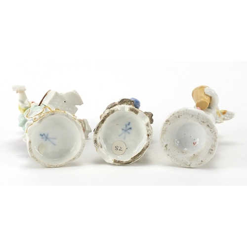 577 - Continental porcelain models of a gatherer and a lady vendor, both with blue cross sword marks to ba... 