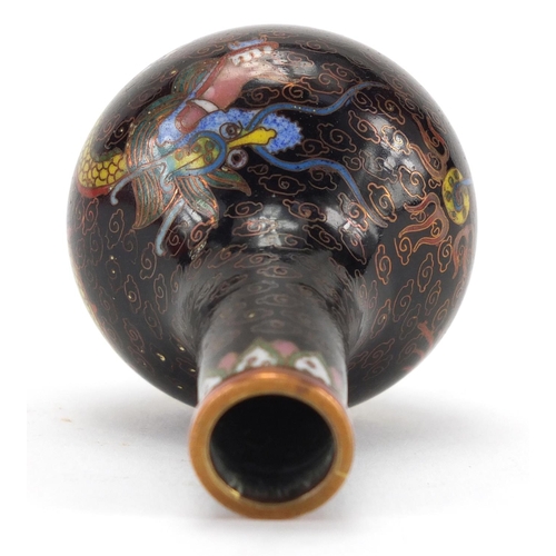 596 - Miniature Chinese cloisonné bottle vase, enamelled with a dragon chasing the flaming pearl amongst c... 