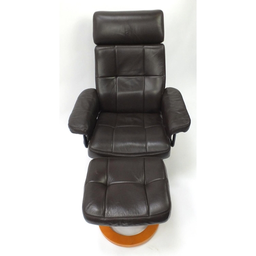 2032 - Brown leather easy chair and foot stool, 100cm high