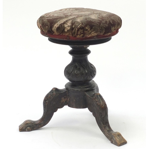55 - Victorian carved oak adjustable piano stool, 50cm high