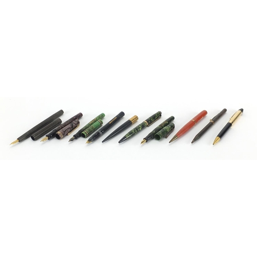 4 - Nine vintage fountain pens, dip pen and propelling pencils including purple faceted Eversharp, green... 