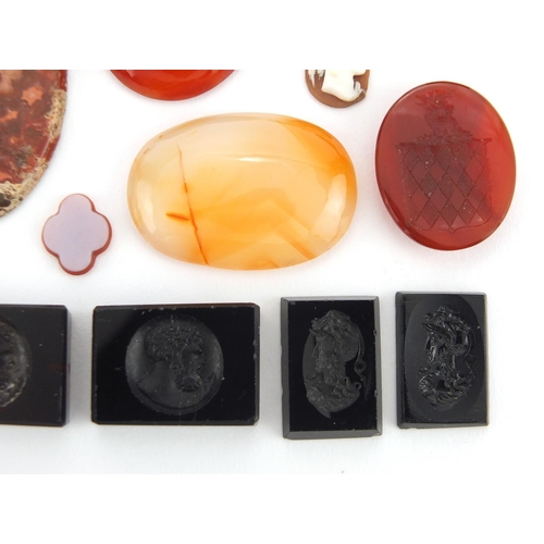 30 - Seventeen 18th century and later intaglio seals and panels including coat of arms and portraits, tog... 