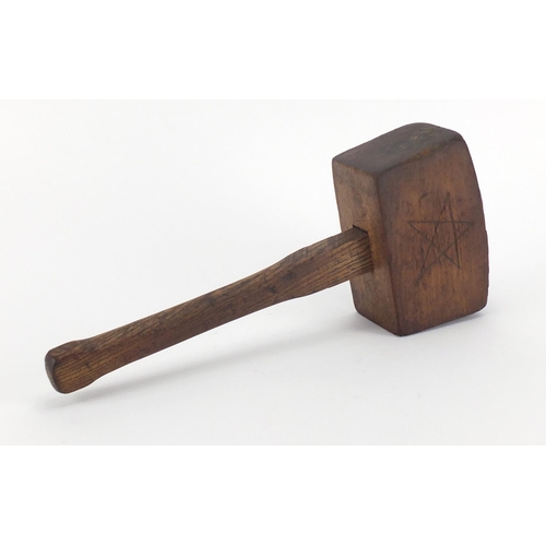 51 - 17th century English oak mallet, incised with a pentagram, 37cm in length