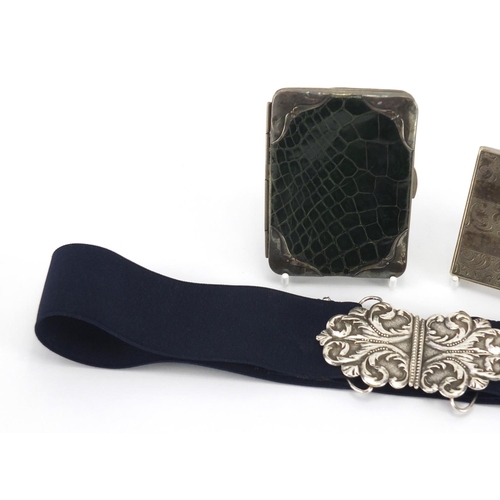 24 - Objects comprising silver mounted crocodile effect leather purse, silver nurses buckle and a silver ... 