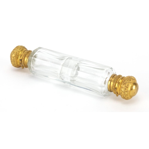 31 - Victorian double ended glass scent bottle, with gilt mounts and faceted body, 14cm in length