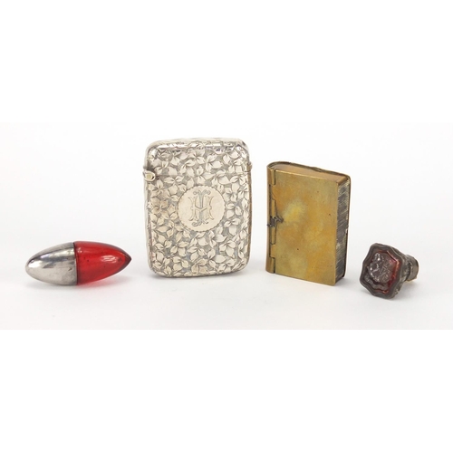 25 - Miscellaneous items including a Intaglio seal and silver vesta with floral chased decoration, the la... 