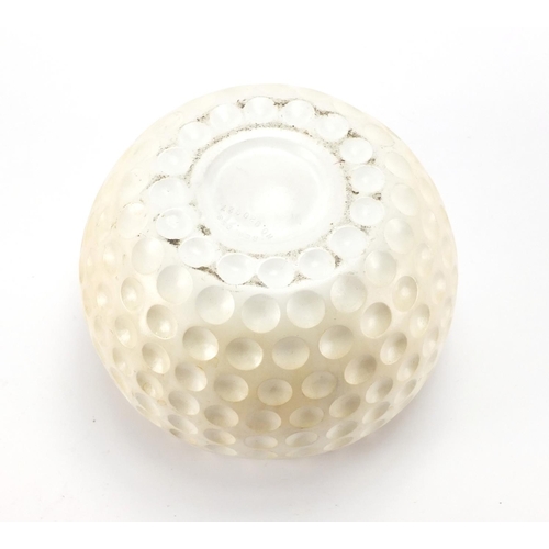 59 - Vintage golf ball design ice bucket, mounted with a silvered golfer, registered design number 920927... 