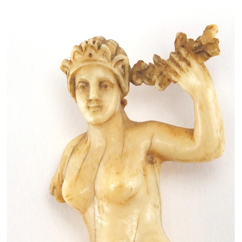 28 - Antique ivory carving of a nude female, 8.2cm high