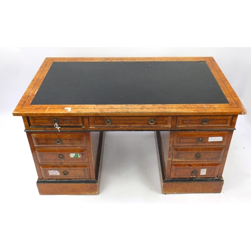 31 - Birdseye maple twin pedestal desk, fitted with nine drawers, 88cm H x 137cm W x 74cm D
