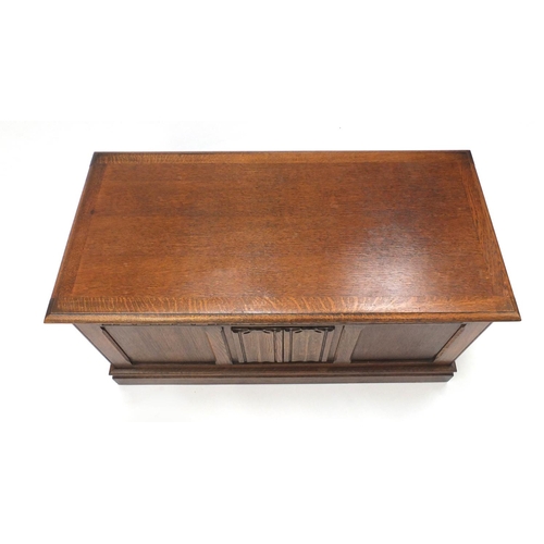 14 - Oak linen fold style blanket box, 52cm H x 95cm W x 46cm D