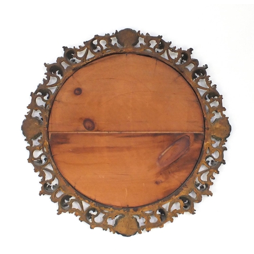 2010 - Circular Florentine gilt wood mirror, carved with acanthus leaves, 72cm in diameter