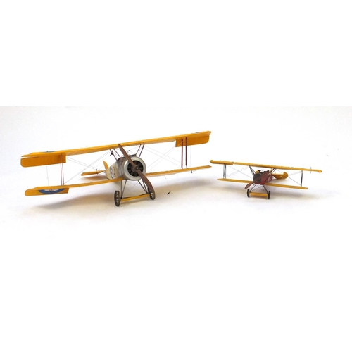 2057 - Two model biplanes, the largest 50cm in length