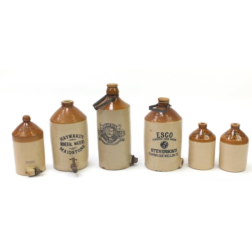 2053 - Six advertising stoneware flagons including R Fry & Co, ESCO Stevenson's and Hayward's, the largest ... 