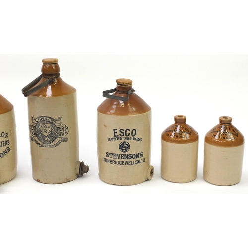 2053 - Six advertising stoneware flagons including R Fry & Co, ESCO Stevenson's and Hayward's, the largest ... 