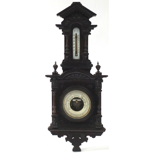 2051 - Black Forest style wall barometer/thermometer, with brass columns, 67cm high