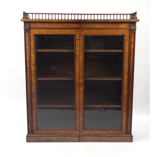 2 - Victorian burr walnut bookcase, the top with baluster gallery above a pair of gazed doors enclosing ... 