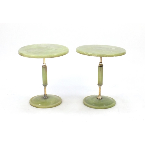 40 - Pair of simulated onyx and brass occasional tables, 43cm high x 37cm in diameter