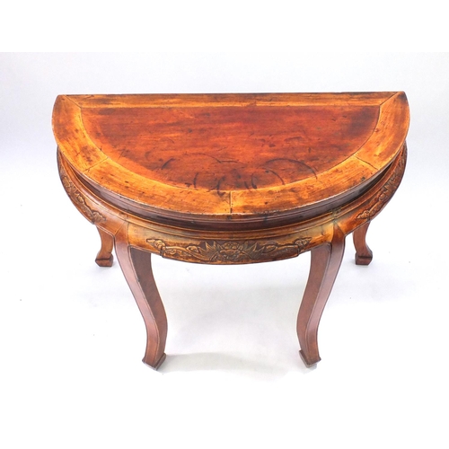 15 - Chinese hardwood Demilune side table, carved with dragon heads, 87cm high x 122cm W x 58cm D