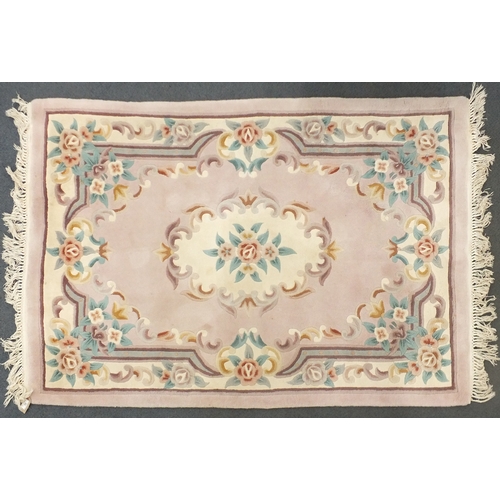 33 - Chinese purple and cream ground rug, 190cm x 120cm