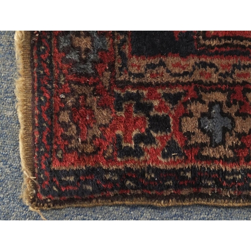 57 - Rectangular Anatolian rug having an all over geometric design, 152cm x 81cm