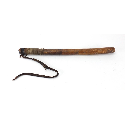 900 - Vintage turned wooden truncheon, with leather strap, 50cm in length