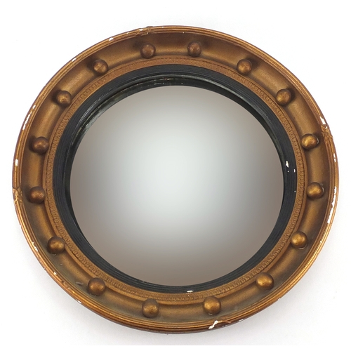 21 - Circular gilt framed convex mirror, 42cm in diameter