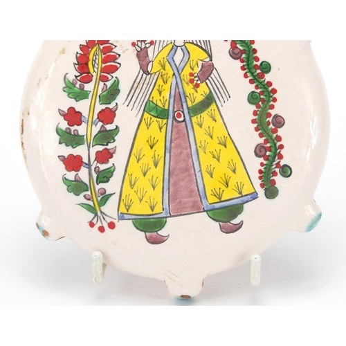 602 - Armenian ceramic water flask, hand painted with two figures in traditional dress, 15cm high