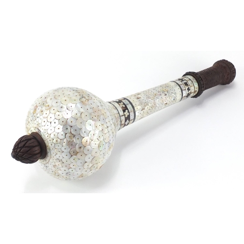 605 - Indian Goa ceremonial carved hardwood mace, overlaid with pinned mother-of-pearl sections, 44cm in l... 