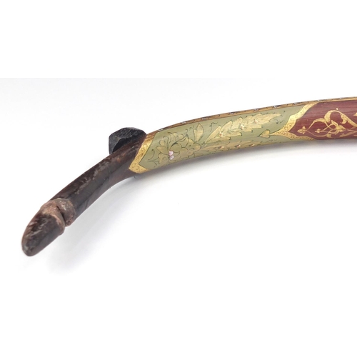 606 - Ottoman lacquered hunting bow of curved form, finely hand painted and gilded with flowers, 89cm in l... 