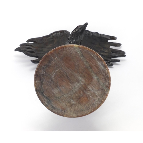 2251 - Bronzed study of a bald eagle on a circular stepped marble base, 42cm high