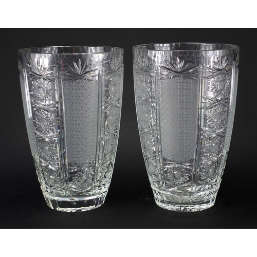 2223 - Large pair of good quality cut glass vases, with flower head motifs, each 30cm high