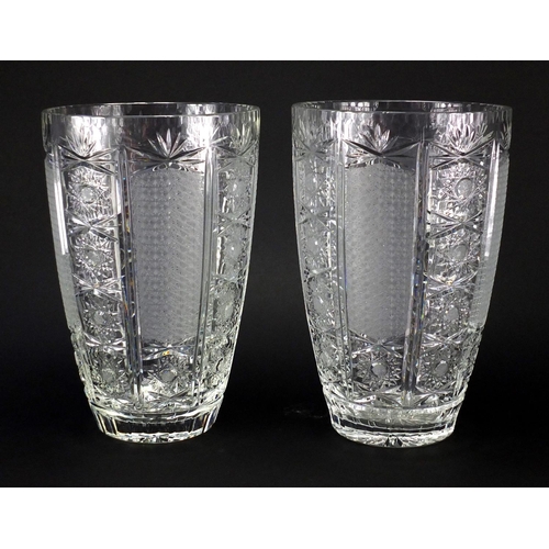 2223 - Large pair of good quality cut glass vases, with flower head motifs, each 30cm high