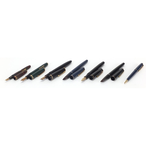 126 - Six vintage fountain pens and a Parker 17 propelling pencil including Watermans and marbleised Conwa... 