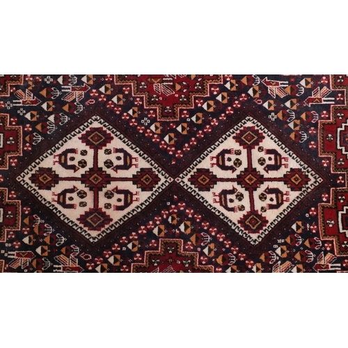 2035a - Rectangular Persian rug having an all over geometric design, 176cm x 139cm
