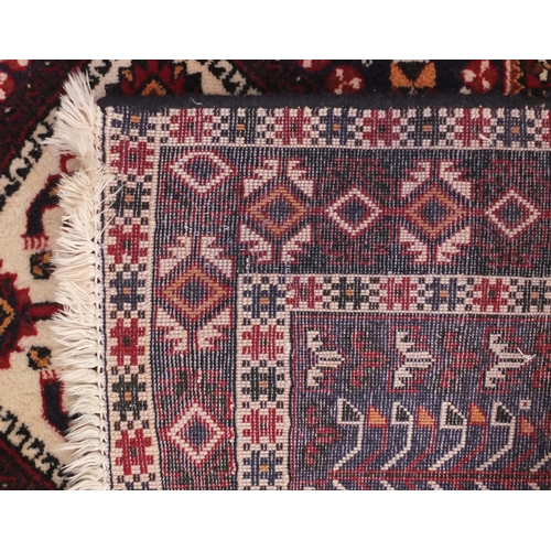 2035a - Rectangular Persian rug having an all over geometric design, 176cm x 139cm