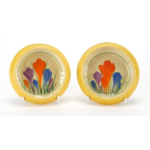 795 - Pair of Clarice Cliff Bizarre dishes, hand painted in the Crocus pattern, each 10cm in diameter