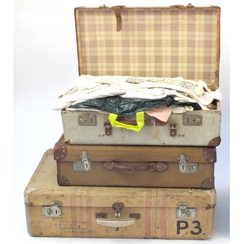 20 - Seven vintage suitcases