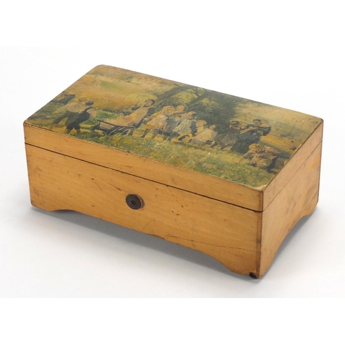 134 - Rectangular boxwood music box, the hinged lid decorated with figures walking in a field, opening to ... 