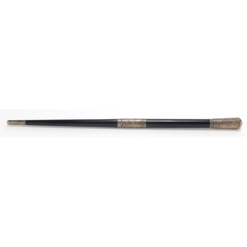 136 - Two piece ebonised conductors baton with silver mounts, housed in a velvet and silk lined Boosey & C... 