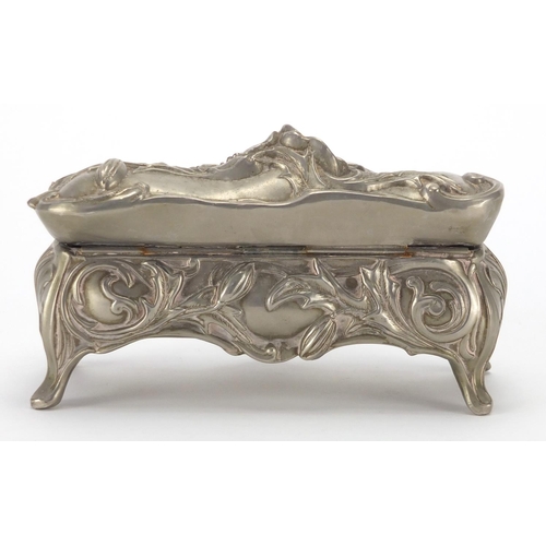 2260 - Art Nouveau pewter four footed casket, decorated in relief with stylised flowers and foliage, 12.5cm... 