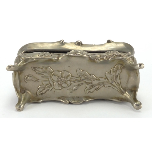 2260 - Art Nouveau pewter four footed casket, decorated in relief with stylised flowers and foliage, 12.5cm... 