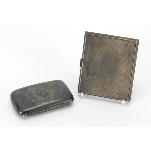 2559 - Two silver cigarette cases with engine turned decoration, Chester and Birmingham hallmarks, the larg... 