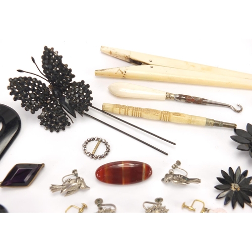 2520 - Vintage jewellery, glove stretchers and hair pieces including cut steel, bone and jet