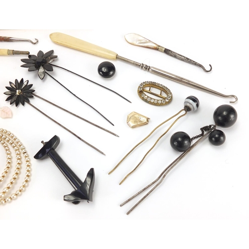 2520 - Vintage jewellery, glove stretchers and hair pieces including cut steel, bone and jet