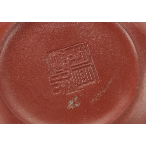 2266 - Three Chinese Yixing terracotta teapots, one with calligraphy, character marks to the base, the larg... 