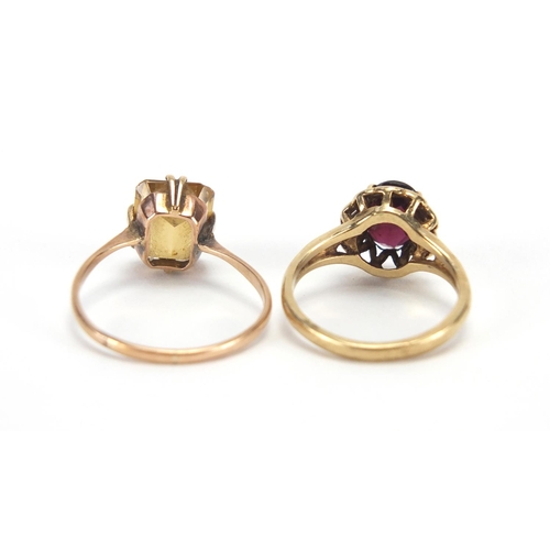 2639 - Two 9ct gold rings set with garnets and citrine, sizes L and Q, approximate weight 4.8g