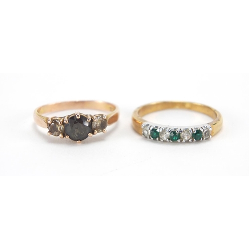 2669 - Two 9ct gold green and clear stone rings, size N and P, approximate weight 4.6g