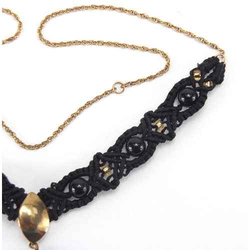 2707 - 9ct gold black jet and cord necklace, 44cm in length, approximate weight 6.4g